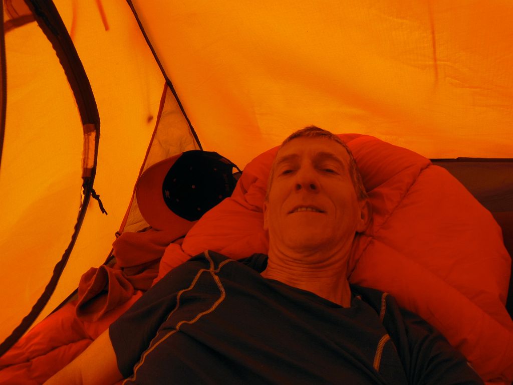17 Jerome Ryan Resting In Tent Waiting For Clouds To Clear From K2 North Face At Intermediate Base Camp 4462m
